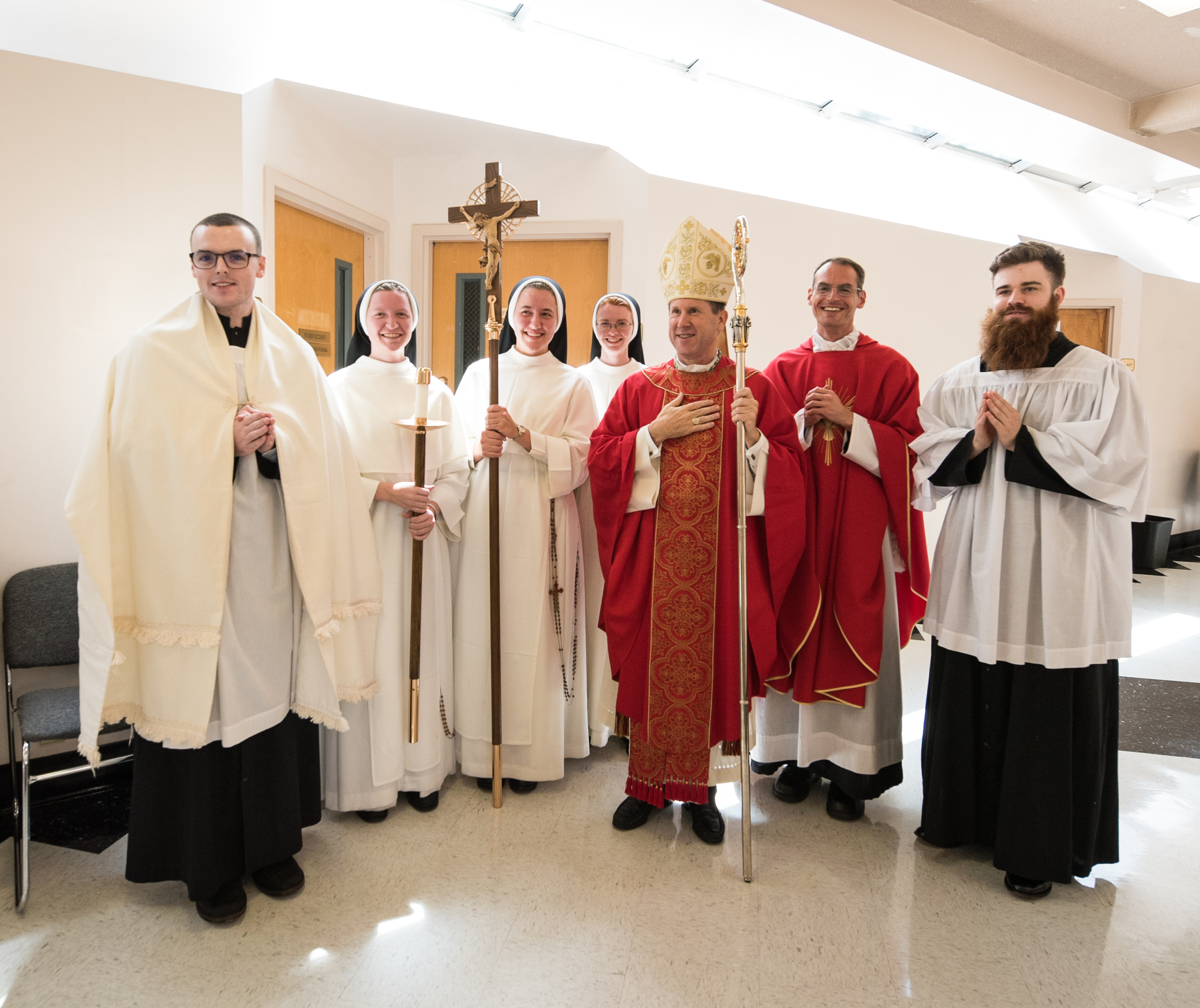 Most Rev. J. Mark Spalding celebrated the Mass of the Holy Spirit at Aquinas College August 28. Fr. Mark Chrismer, right, and Fr. Gervan Menezes (not pictured) with students of Aquinas College. Photo by Sr. Mary Justin Haltom, O.P.